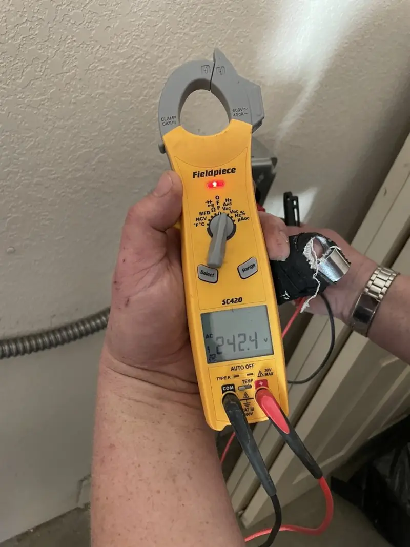 Voltage testing with clamp meter during Generator Installation in Twin Lakes